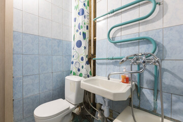 modern bathroom room with toilet and washing machine