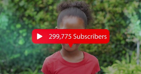 Standing child in red T-shirt in backyard, displaying red subscriber overlay with white play icon
