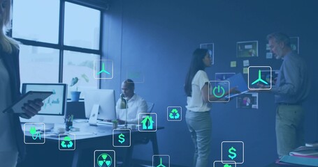 Collaborating four in business casual using PCs and discussing at modern office with eco icons