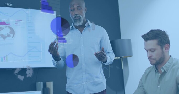 Presenting mature man in light shirt gesturing and explaining on conference screen with AR overlays - Powered by Adobe