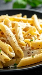 Delicious Penne Pasta with Creamy Sauce and Black Pepper.