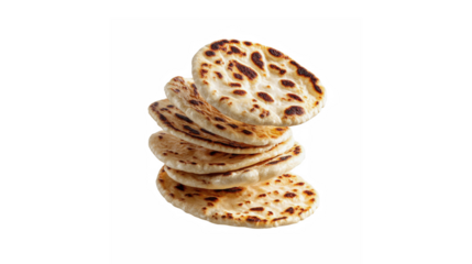 A stack of freshly baked flatbread with char spots, isolated on a black background