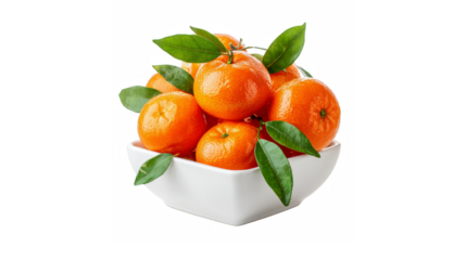 A white bowl filled with fresh, vibrant tangerines and green leaves on an isolated black background.