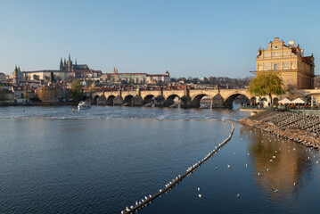 Obraz premium Prague skyline with Charles Bridge over Vltava River