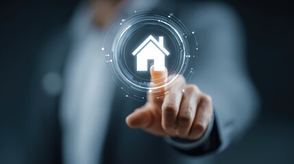 Man's finger touching a digital house icon on a futuristic interface