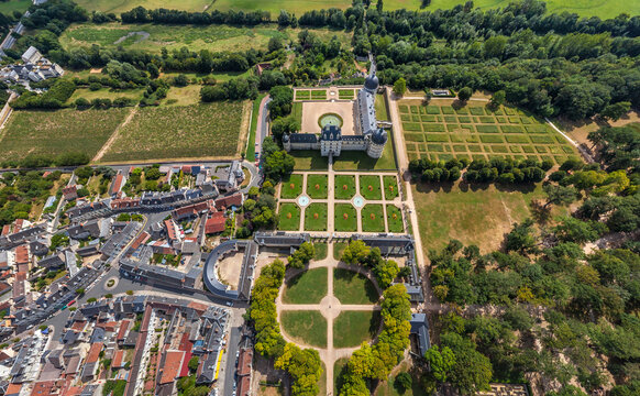 Aerial view of Chateau de Chaumont glows amidst manicured gardens and the Loire's verdant embrace, a tapestry of history and nature, Chaumont-sur-Loire, Centre-Val de Loire, France.