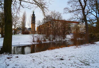Weimar, Germany, Ilm Park in winter season, view to the Town castle and Museum building