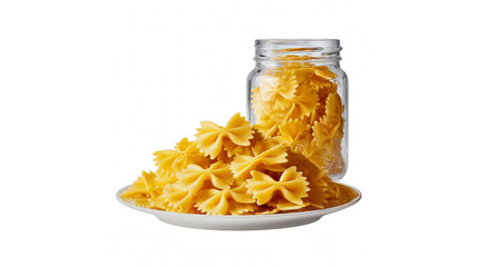 A vibrant display of uncooked bow tie pasta presented on a white plate with a full glass jar in the background