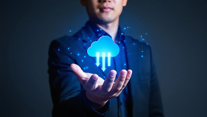 Man holding blue cloud with download arrows in his hands with digital network connections transparent background