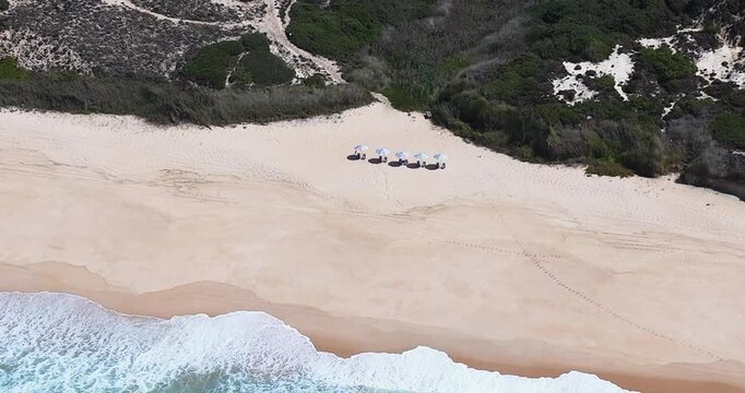 Aerial Drone Shot of Atlantic Ocean Meeting Sandy Coastline on the Alentejo Coast