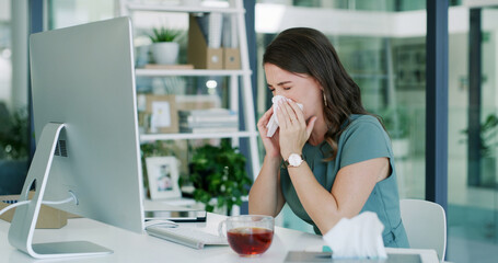Sick, blowing nose and woman in office with tea, ease congestion or antioxidant benefit for allergy season. Health, tech or employee in agency with warm drink, virus or immune support for viral flu.