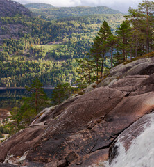 Beautiful mountain landscape in Norway - Mountain slope, lake, reflection