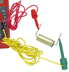 Testing radio element with multimeter on white