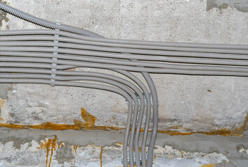 Installation of electrical wiring on the concrete ceiling