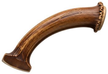 Curved brown deer antler piece for knife handle material on a transparent background