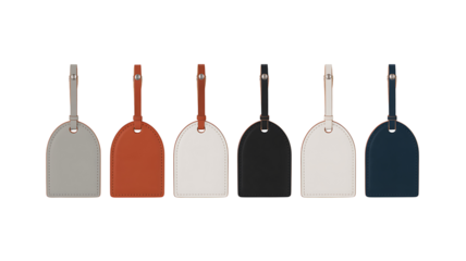 Colorful leather luggage tags with straps isolated on white background
