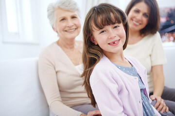 Happy kid, grandmother and portrait of mother in home, bonding or connection with generations. Mom, grandparent and girl child in living room for relax, love or care for family together with daughter