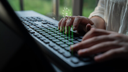 Close-up of hands typing on a modern keyboard with a digital graph overlay, symbolizing data analysis and technological innovation in a contemporary workspace setting. Gantry