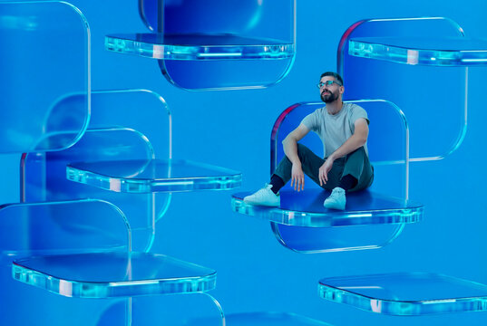 Man resting on suspended 3D glass shelves against a blue background