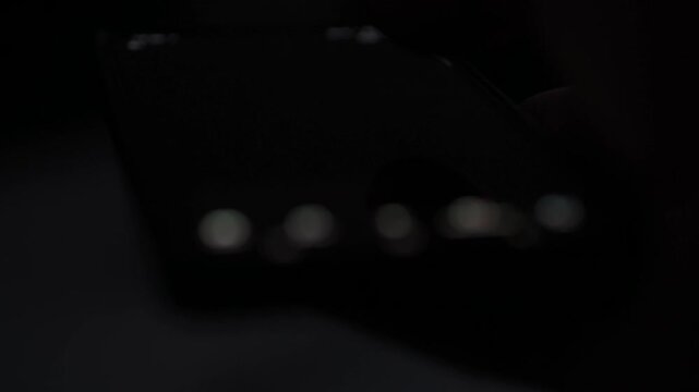 Blurred Smartphone Scrolling and Content Consumption Close Up