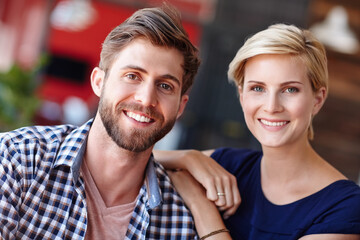 Fototapeta premium Portrait, couple or people in home with smile, connection and support for healthy relationship. Happy, married woman or man in apartment with kindness, commitment or bonding together in house.
