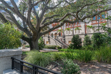 Obraz premium Historic public building in St Augustine Florida USA surrounded by greenery and urban life