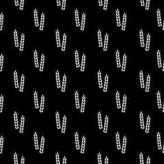 Fototapeta premium Wheat and rye ears icon seamless pattern isolated on black background