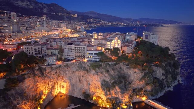 Aerial Cityscape Golden Hour Over Facades, Hillside Skyline And Coastal Bay Drone Sweeps Across Ornate Palace. Monaco