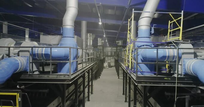 Roller Kiln for the Production of Ceramic Tiles. Firing. The roller kilns. Industrial drying for ceramics. Industrial kilns for Ceramic Tiles. Ceramic tile manufacturing plant. Indoors. Inside