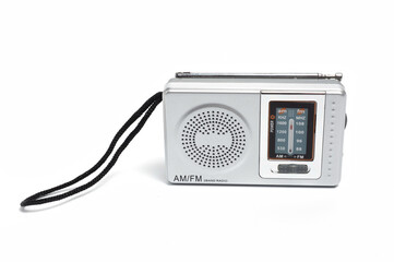Portable battery-powered AM/FM radio photographed against a white background.