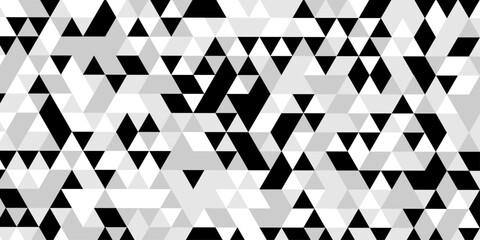 Abstract geometric pattern of triangles in grayscale creating a visual texture, a striking black and white optical illusion features a dynamic pattern of repeating triangles creating a sense of depth. © Abu Bokkor Siddique