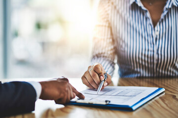 People, sign and hands with document, desk or agreement for business deal or collaboration in...