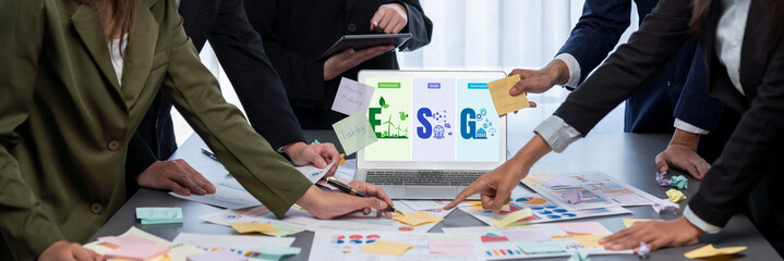 Analyst team use sticky note for creative and analytic brainstorm for business idea with BI data dashboard on laptop screen. Analysis financial data visualization tech for marketing strategy. Prodigy