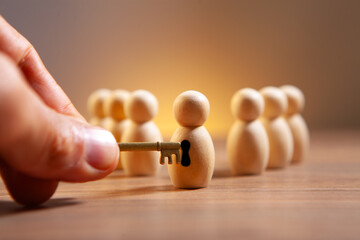 Businessman holding key to success. Business concept of leadership and success.