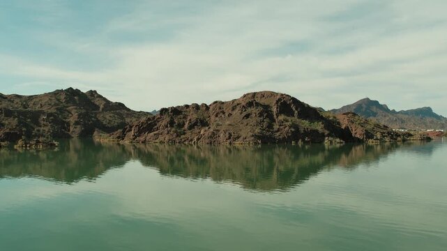 Bill Williams River beautiful mountains reflecting on calm water in Arizona