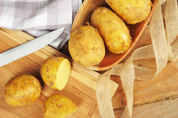 young potatoes on a wooden