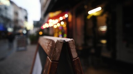 Chalkboard Cafe Menu Board With Daily Specials And Promotions Enhances The Cozy New Year Atmosphere Created By Magical Christmas Illuminations In The City