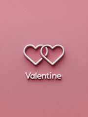 Minimal Valentine&rsquo;s Day greeting with white hearts and text on soft pink background