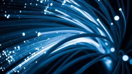 Fiber optic cables glowing blue abstract network connection