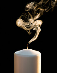 A white candle with a diminishing flame casts faint light and wispy smoke trails upward against a dark backdrop.