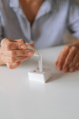 Rapid test strip in hand, respiratory virus screening, influenza, COVID-19, pneumonia, epidemic, healthcare diagnostics, infection control, home self test, copy space