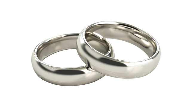 Two silver wedding rings intertwined, isolated ona  white background, marriage and love concept