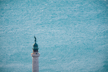 .Lighthouse overlooking the sea in windy weather