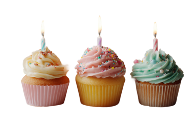 Sweet birthday cupcakes decorated with burning candles creating a warm celebratory atmosphere isolated on transparent background PNG