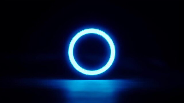 Glowing blue circle on dark background with reflection