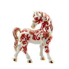 Porcelain horse figurine with red and gold patterns, isolated on clean white, soft shadow, studio light isolated on white background 