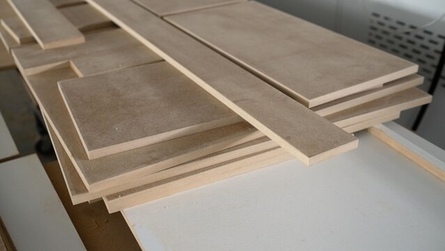 Stacked mdf fiberboards preparing for carpentry work