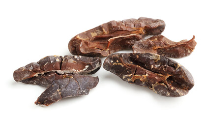 Obraz premium Pieces of natural cocoa beans isolated on white