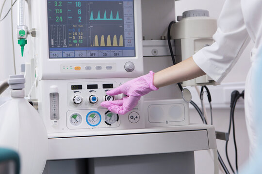 The anesthesiologist prepares the equipment for the operation. Medical care. Equipment for anesthesia and artificial respiration of the patient during surgery.