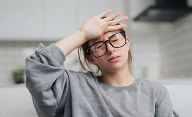 Young Girl Feels Bad At Home And Has A Severe Headache